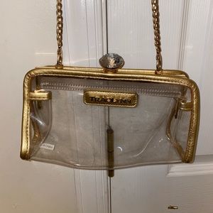 Slightly used Traci Lynn clutch